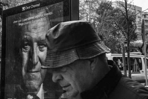 Under the rain Black and white man under the rain coat hat